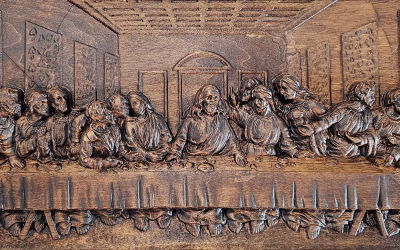 Detailed wooden relief carving of the Last Supper
