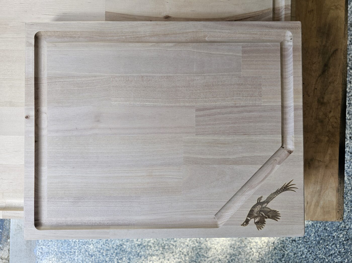 Engraved pheasant cutting board by Klein's Designs ND